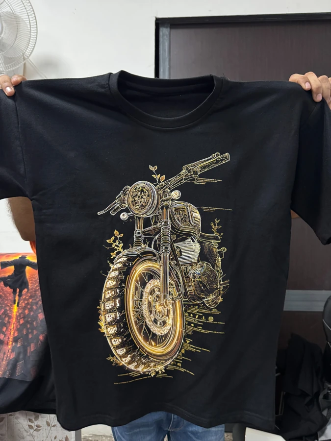 Gold-toned motorcycle linework DTF print on a black T-shirt